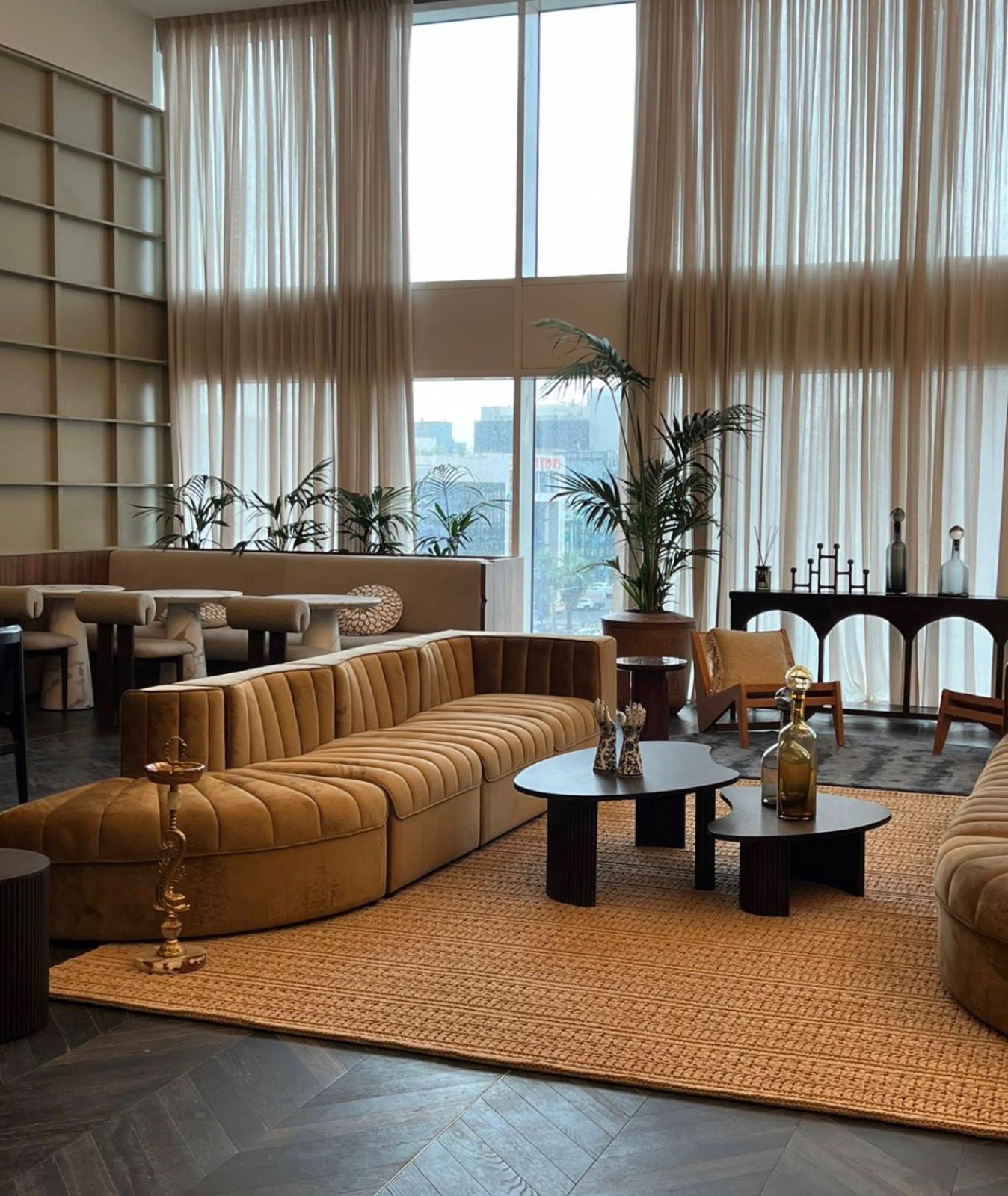 Rooms by Fattal — double-height lounge